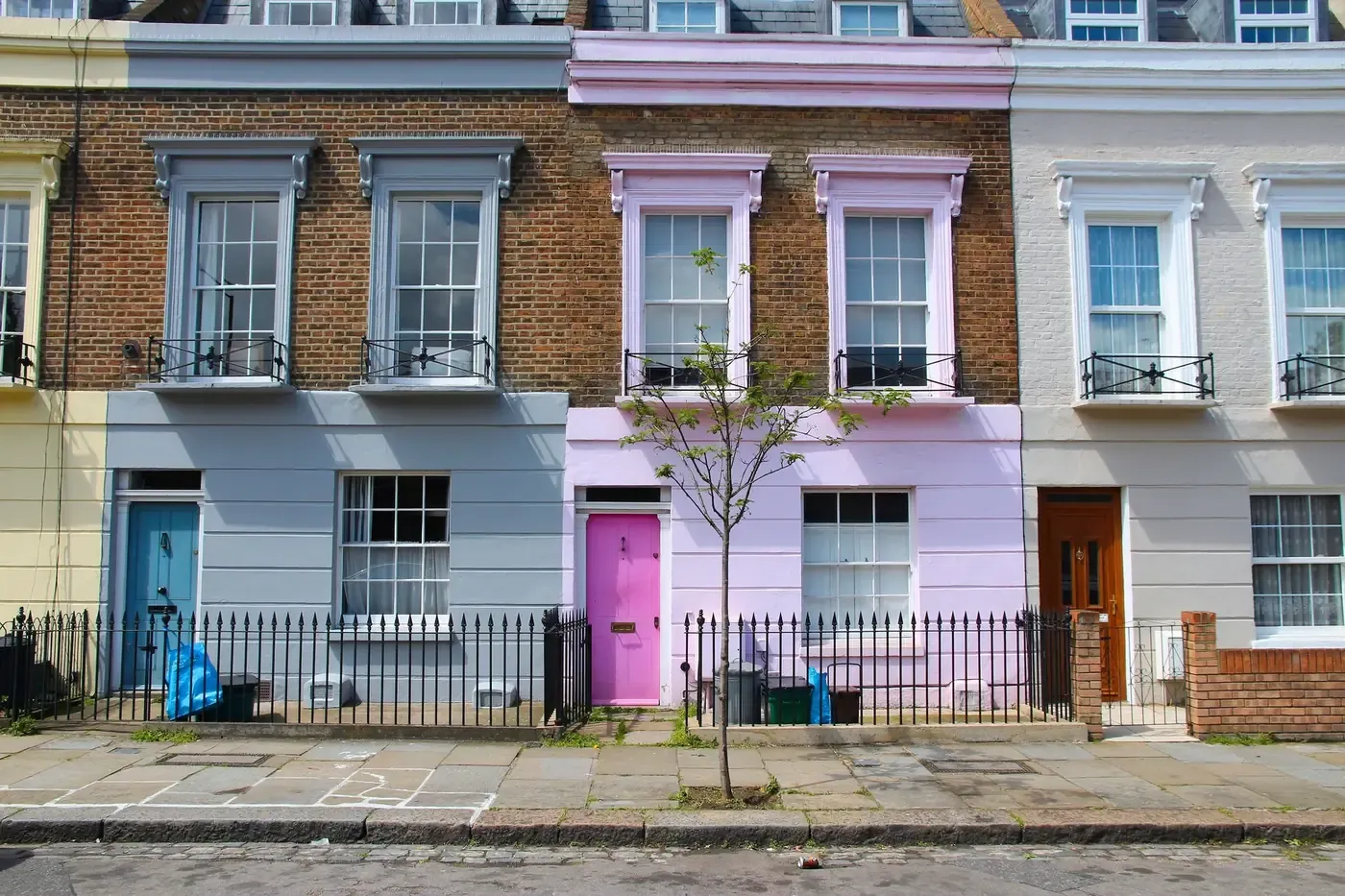 Repainted exterior masonry and woodwork on a London property